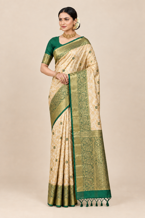 Model in cream brocade saree wearing a gold temple necklace