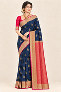 Model in navy saree with the red and gold pallu starting right below the waist